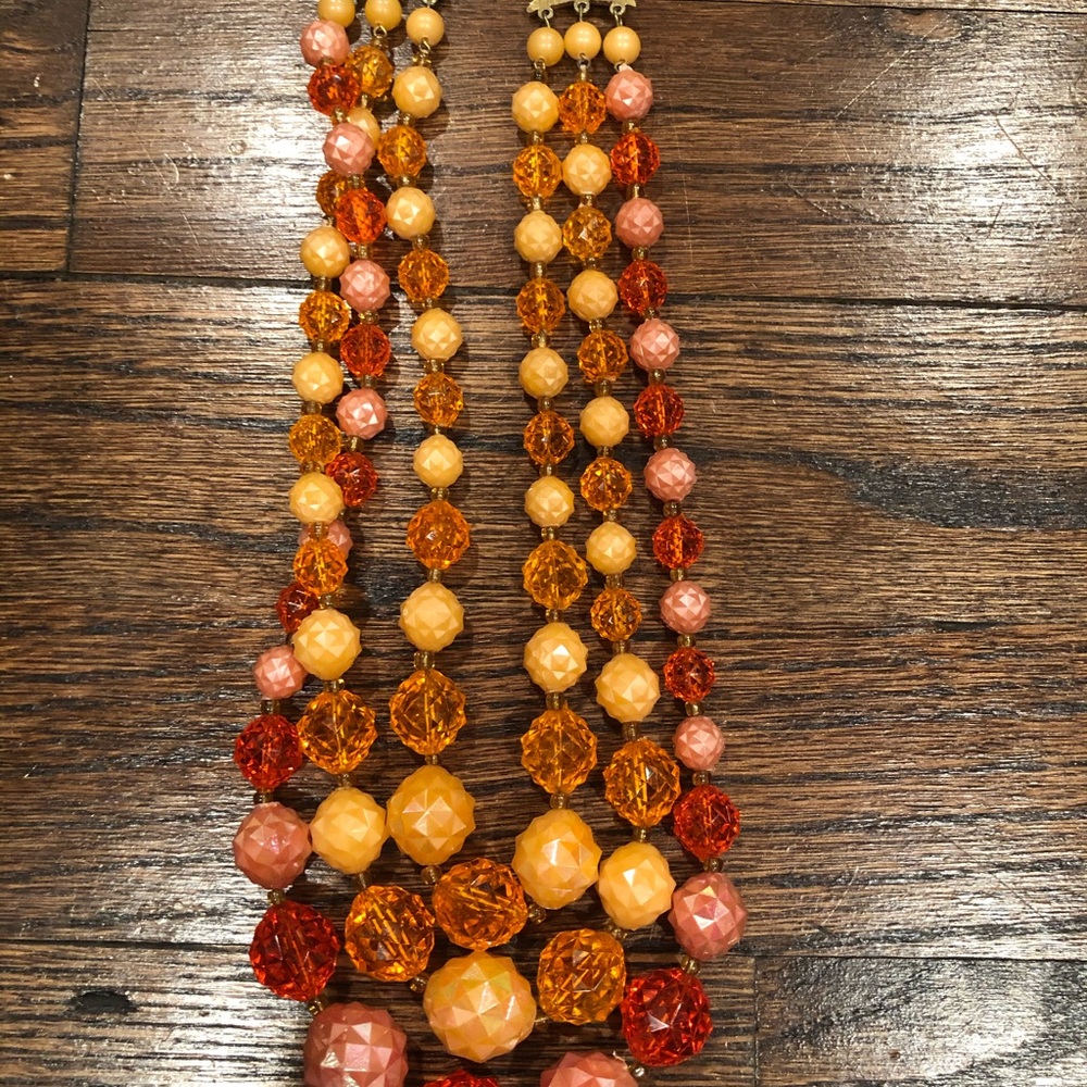 Triple strand orange vintage lucite necklace
